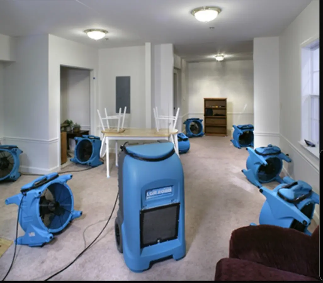 Air movers and dehumidifier setup for Water Damage Restoration in Southington